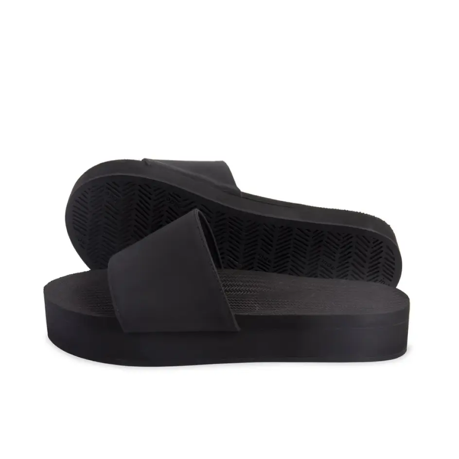 Elegant custom platform flip flops, designed for comfort and style, perfect for a luxurious summer getaway.