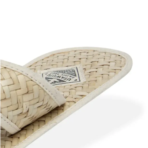 Comfortable in-room cross slippers that provide warmth and style, perfect for lounging around the house.