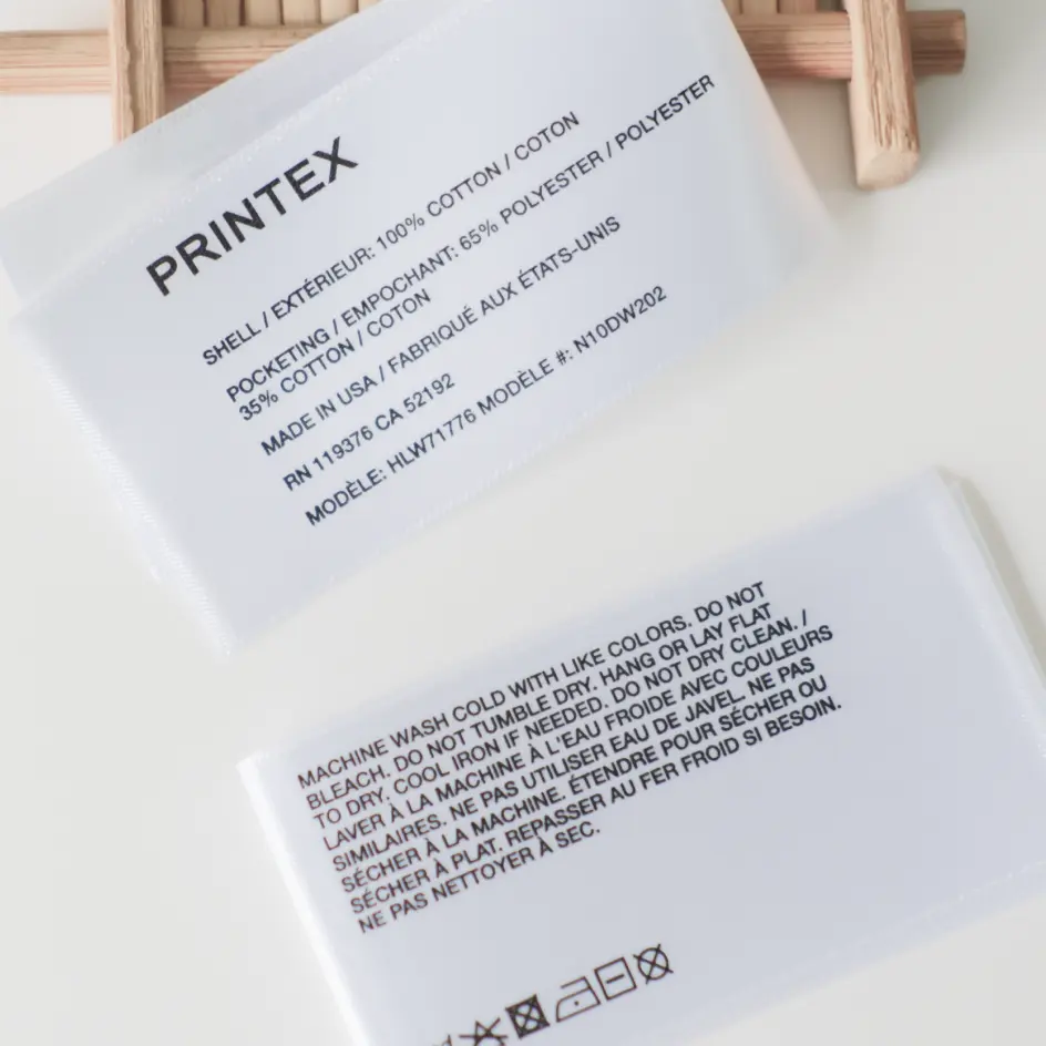 Custom care labels featuring clear care instructions for clothing, promoting proper maintenance and extending garment life.
