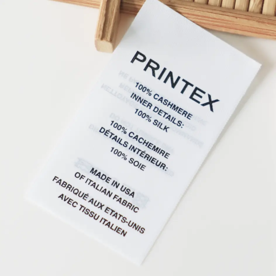 High-quality custom care labels featuring robust base material, designed to deliver clear garment care guidance.
