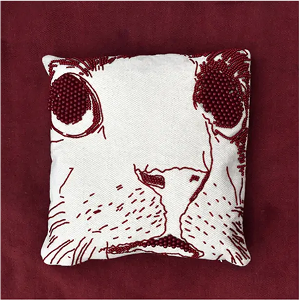 A plush, textured pillow with aesthetic patterns for a trendy home decor vibe.