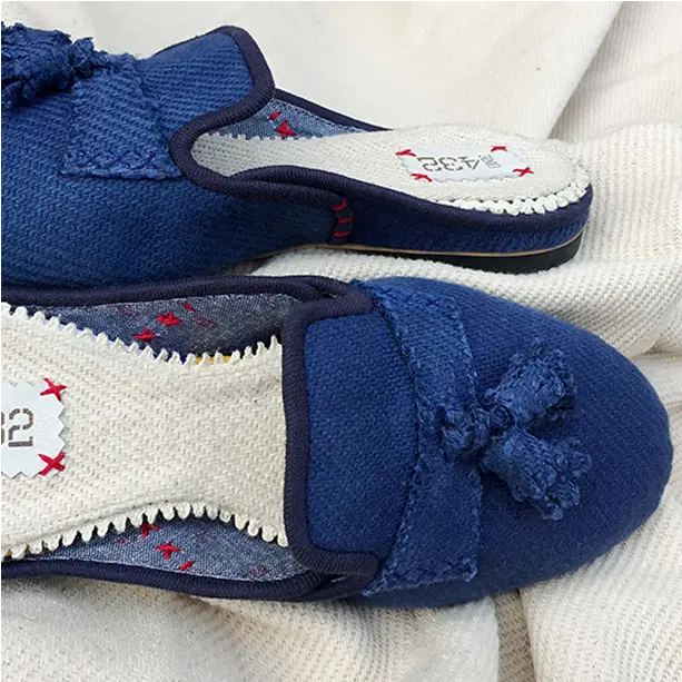 Soft deep blue cotton slide slippers made for special occasions.