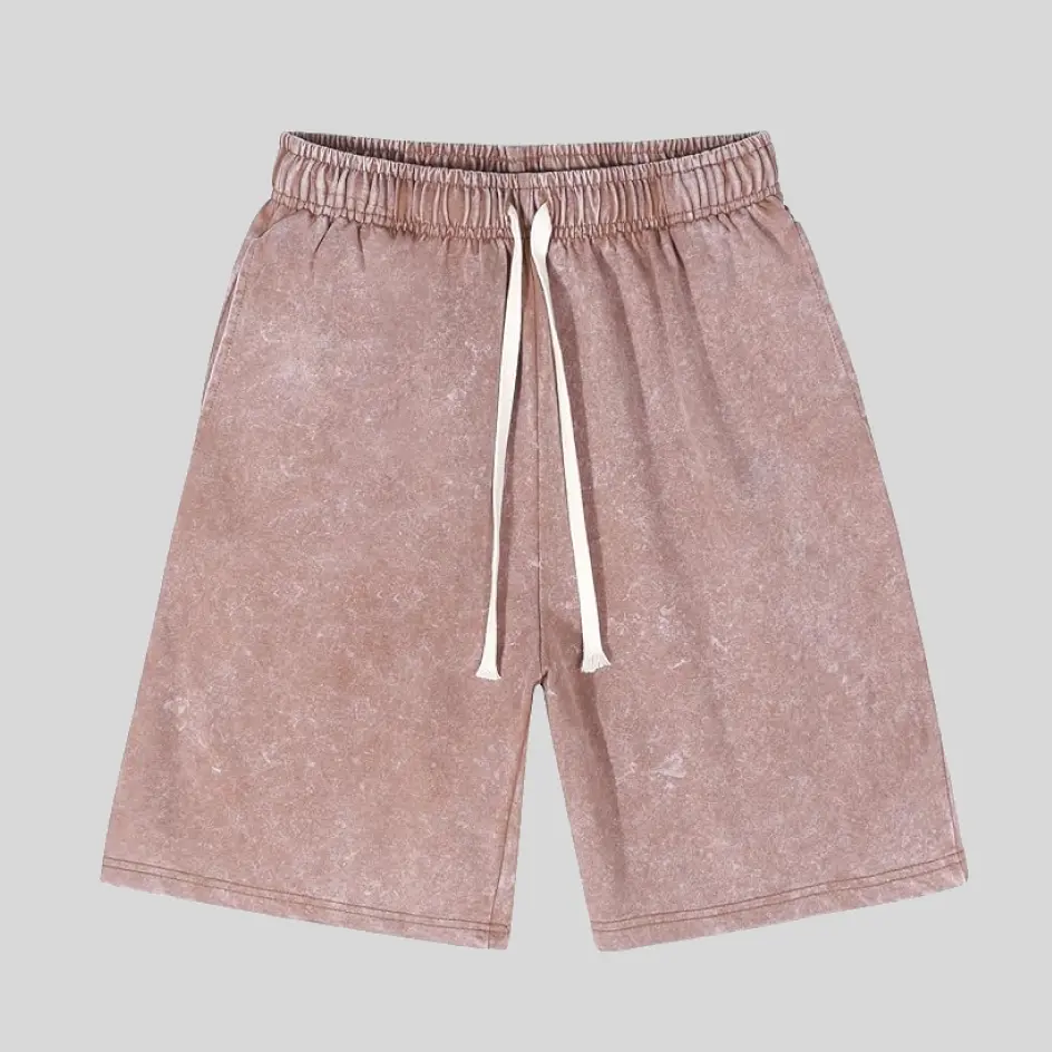 Edgy mineral wash shorts featuring a unique faded finish, adding a vintage streetwear appeal.