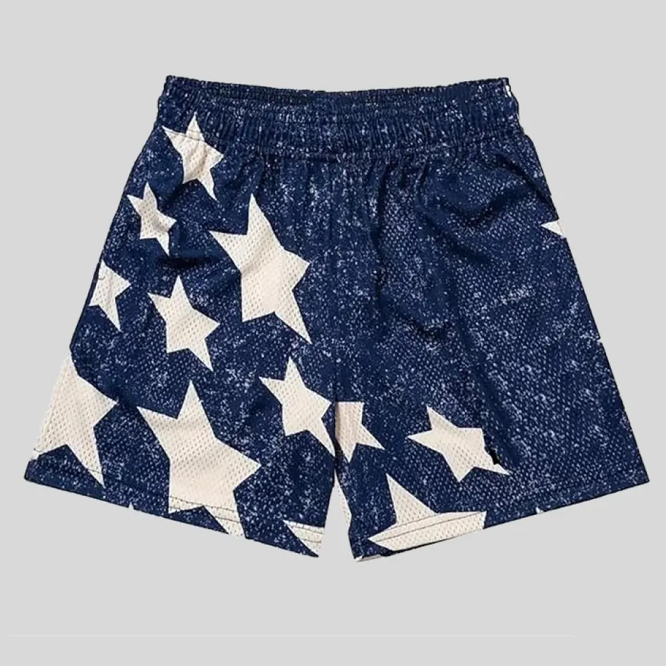 Bold applique designs on shorts, adding a dimensional and tactile element to casualwear.