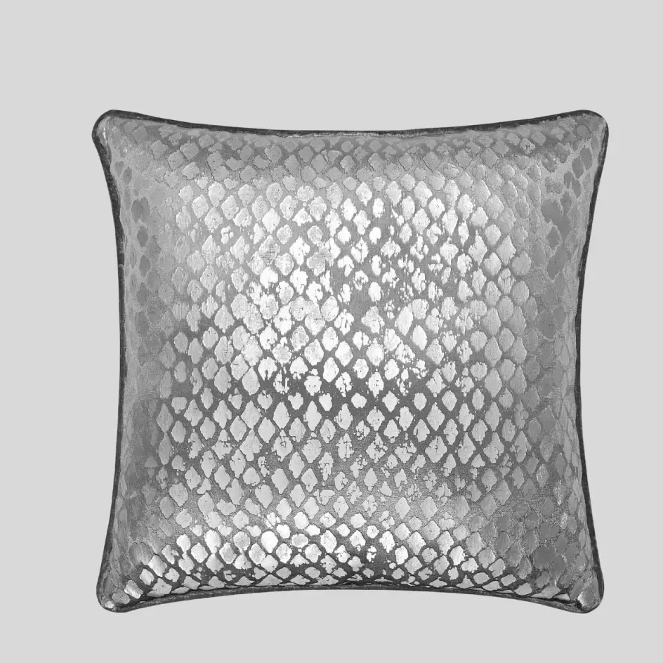 A modern pillow with metallic foil accents, adding a sleek and reflective shimmer for a luxurious touch.