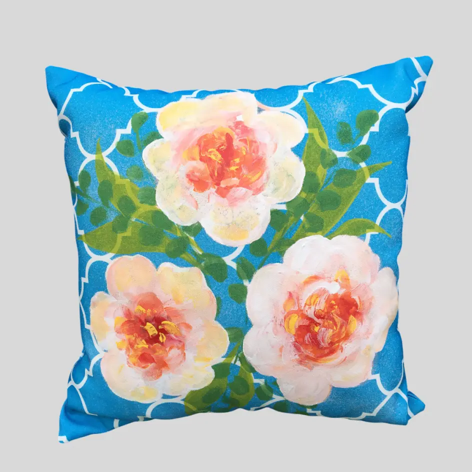 A unique pillow featuring hand-painted designs, showcasing artisanal craftsmanship with custom artistic details.