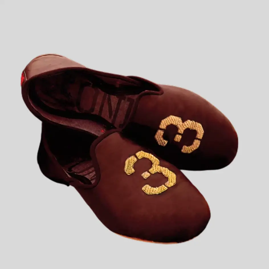 Velvet slippers adorned with textured chenille lettering or designs, creating a raised, plush effect for a bold and stylish look.