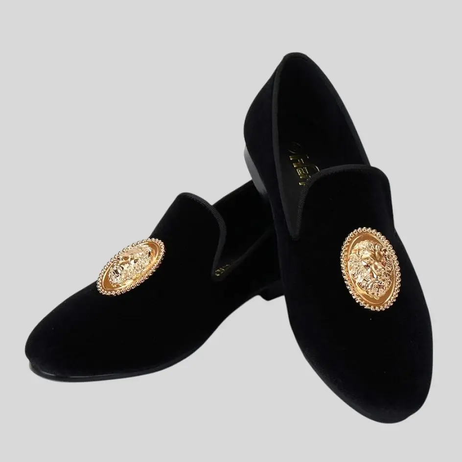 Velvet slippers with metallic foil accents, shimmering elegantly against the plush fabric for a luxurious, eye-catching effect.