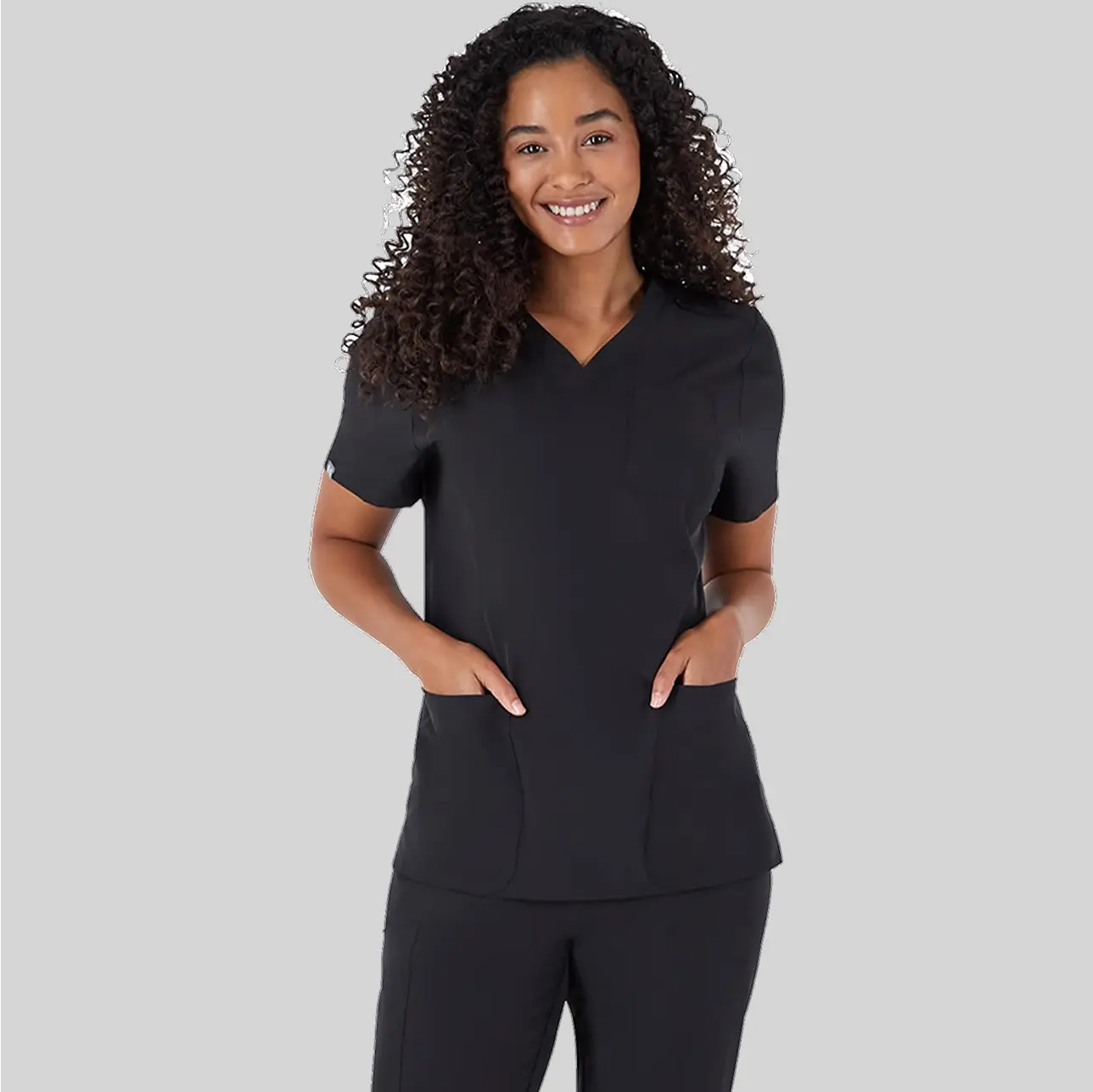 A professional scrub top made from breathable fabric, designed for comfort and flexibility during long shifts.