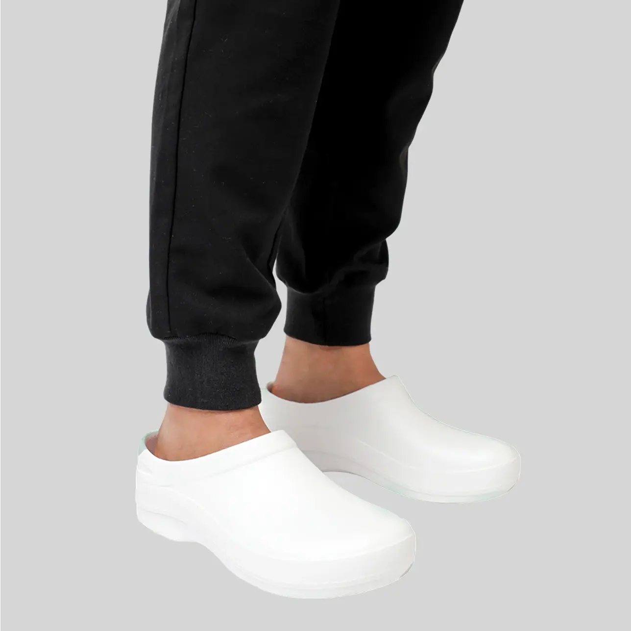 A pair of slip-resistant medical shoes with arch support, offering comfort and stability for healthcare workers.