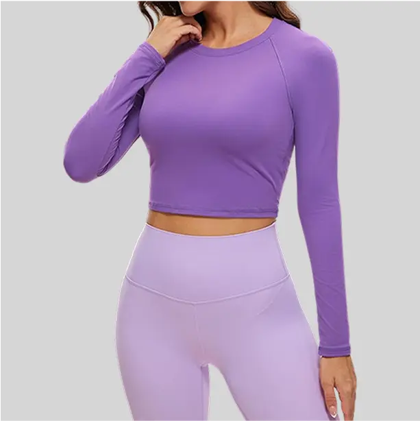 A cropped long sleeve yoga top with a snug fit, combining fashion with functionality.