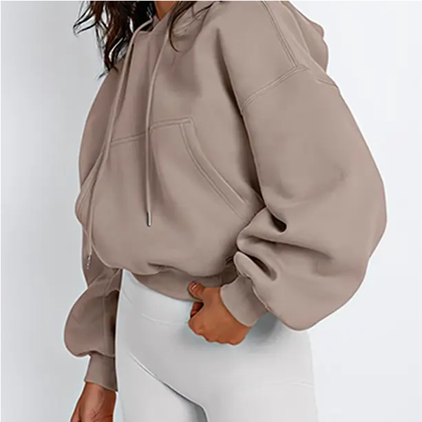 A fleece-lined cropped yoga hoodie with ribbed cuffs, providing warmth and comfort.