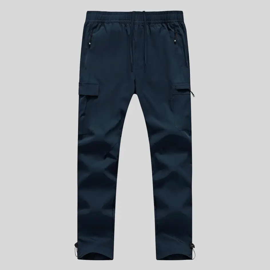 A deep navy-colored quick-dry cargo pant, blending classic style with performance-driven comfort.