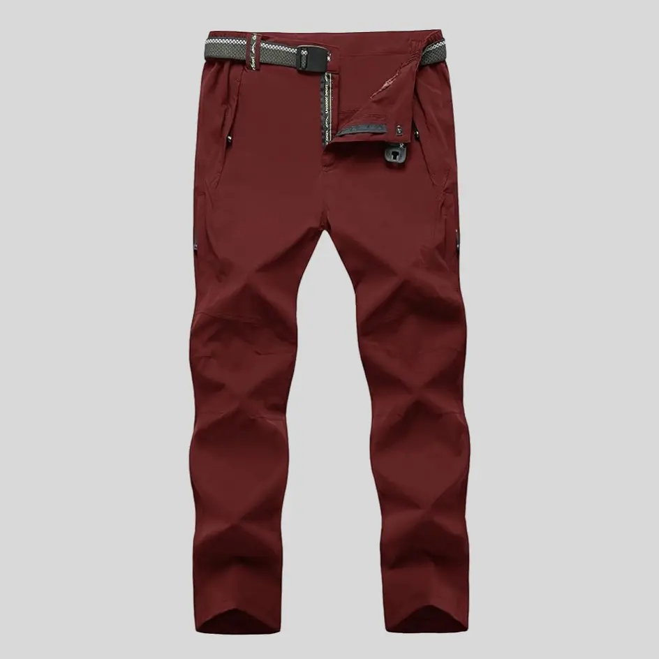 A rich burgundy quick-dry cargo pant, offering a unique and stylish look while maintaining performance benefits.