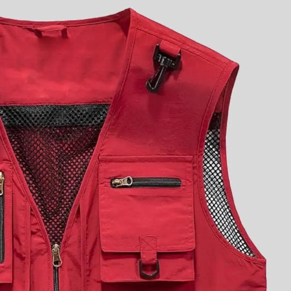 A water-resistant insulated fishing vest designed to repel moisture and provide protection against splashes and light rain.