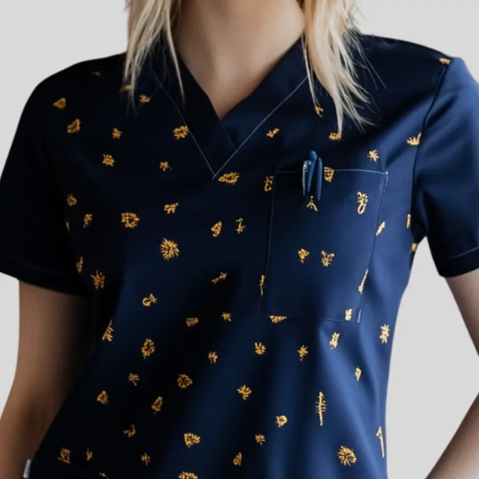 A scrub top with custom screen-printed branding, adding a sleek and durable design element.