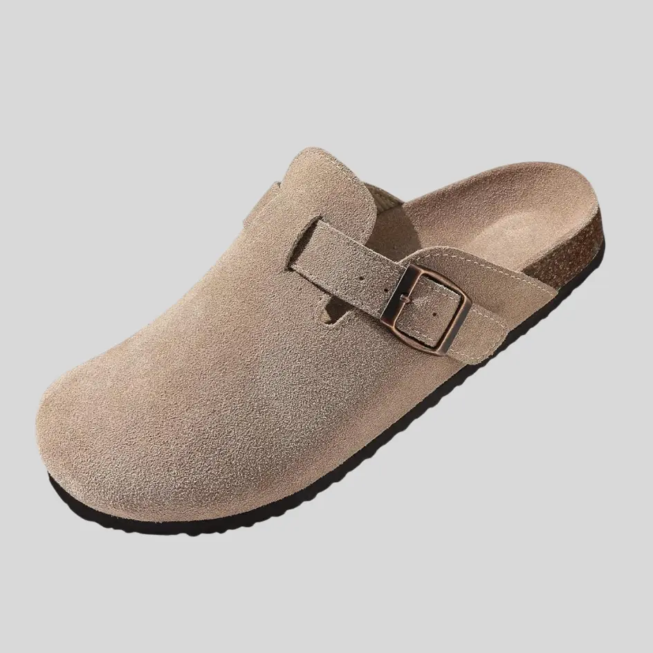 A pair of leather clogs with a smooth finish, offering durability and a classic look.