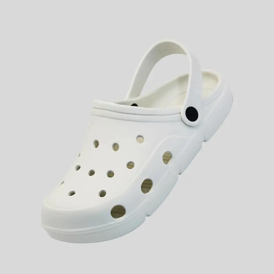 A pair of white clogs with a sleek and minimalist design, ideal for professional settings.