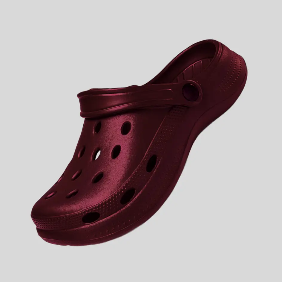 A pair of burgundy clogs, featuring a rich and deep hue for a sophisticated look.