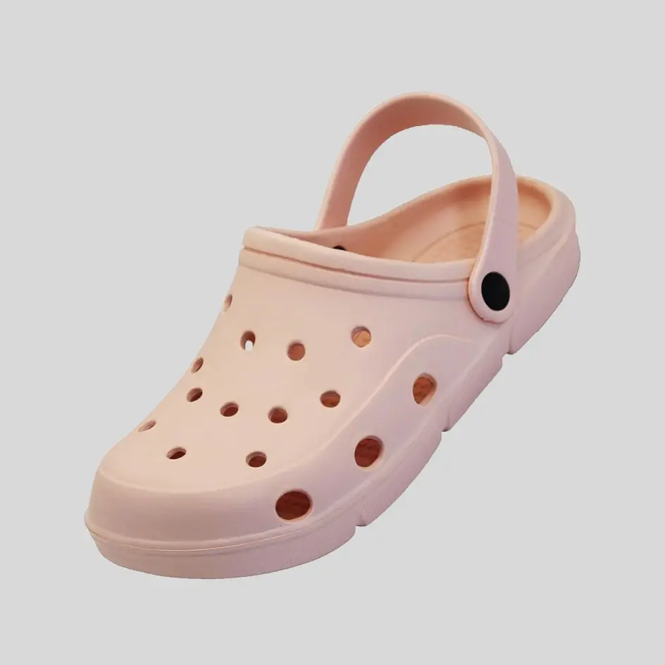 A pair of pink clogs with a fun and playful shade, perfect for a unique style statement.