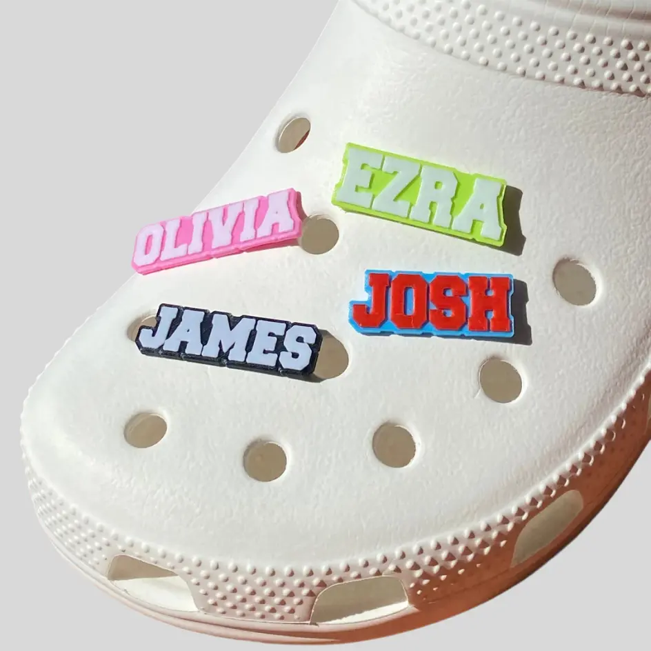 A pair of medical shoes customized with names, allowing for a unique and identifiable design.