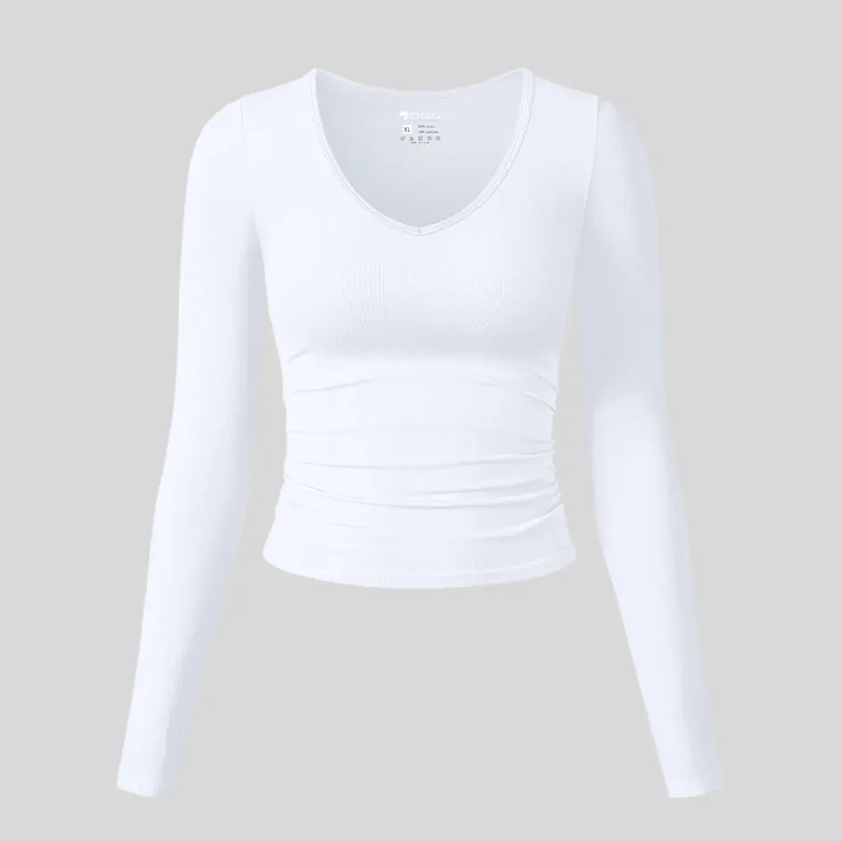 A cotton long sleeve yoga top, providing breathability and softness.