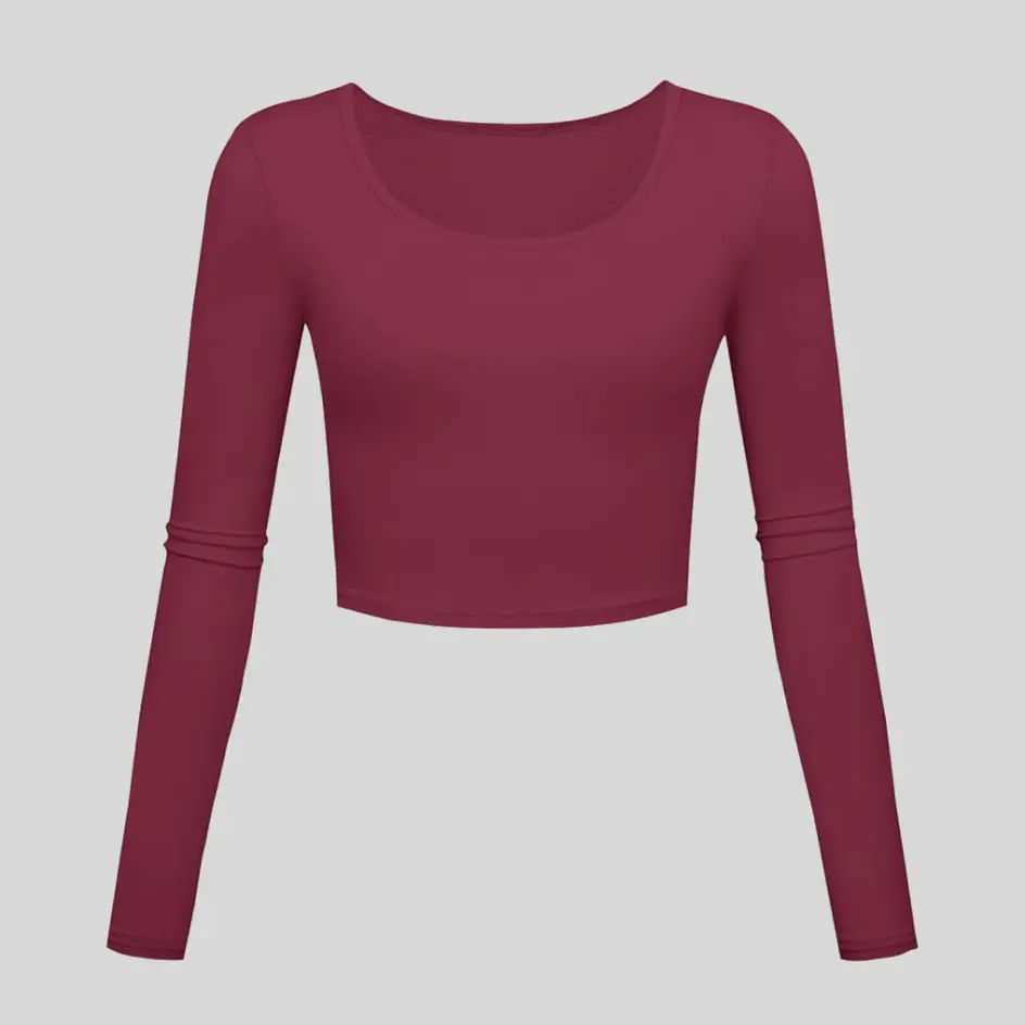 A maroon long sleeve yoga top, adding warmth and elegance.