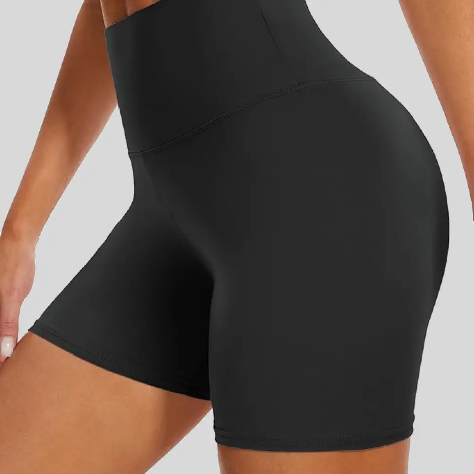 Black yoga shorts, offering a sleek and versatile look.