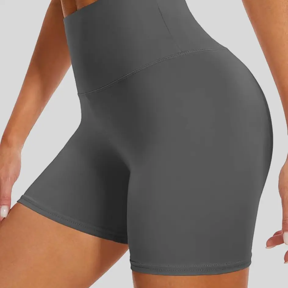 Charcoal yoga shorts, combining neutrality with sophistication.