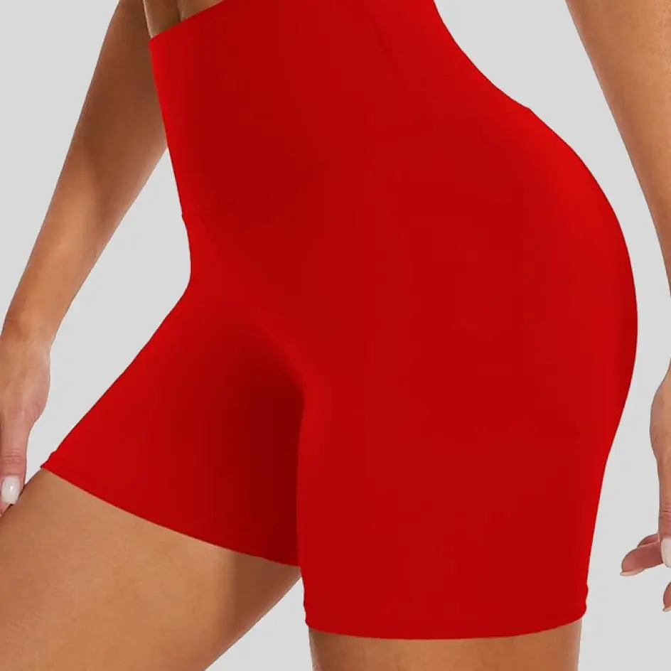 Red yoga shorts, making a vibrant and powerful statement.