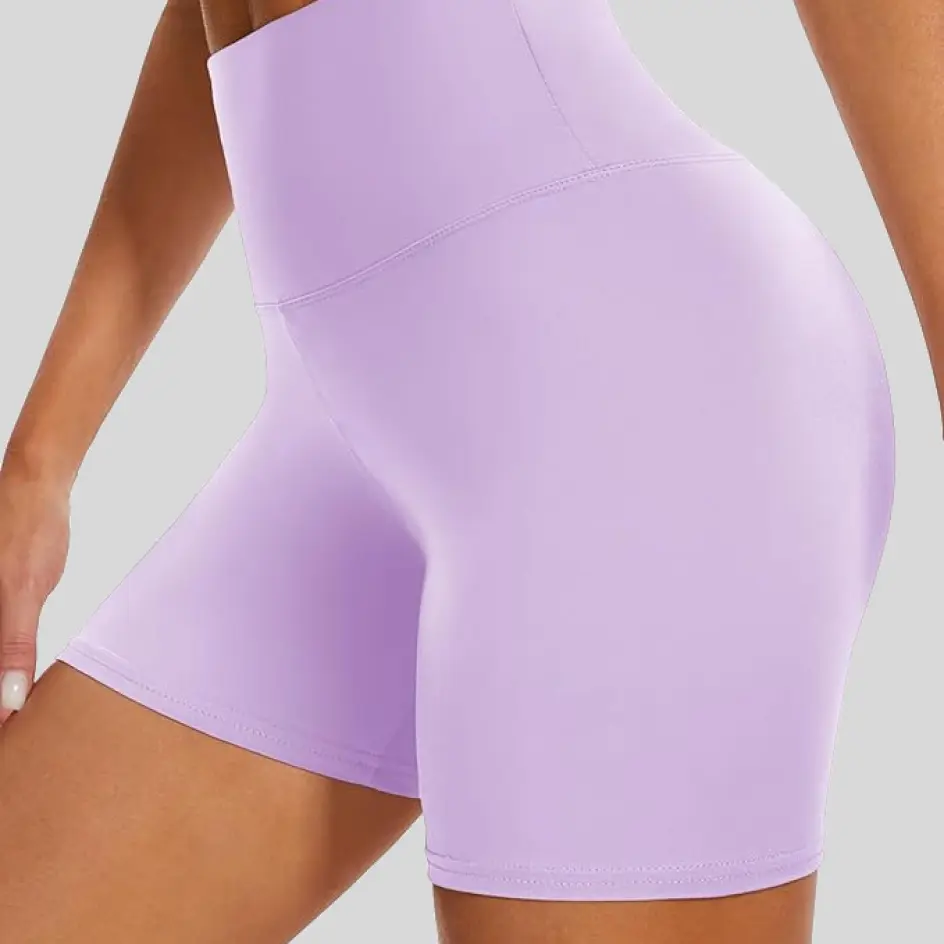 Purple yoga shorts, adding a unique and stylish touch.