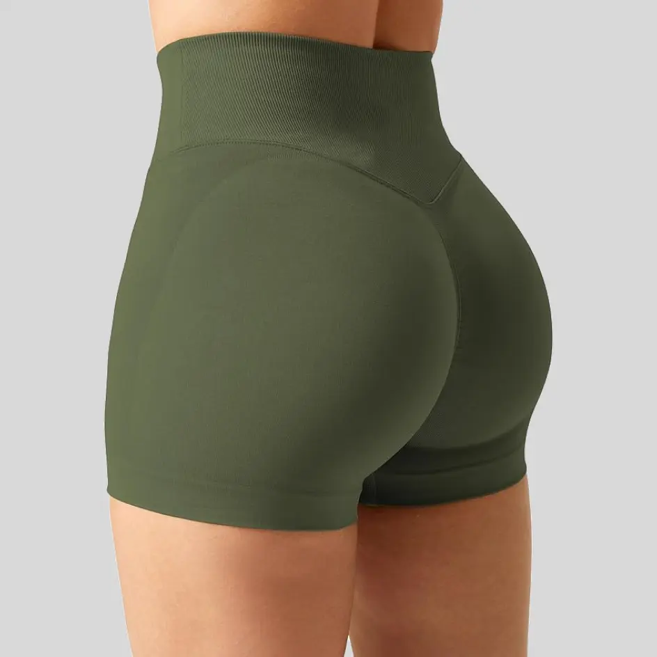 Forest green yoga shorts, blending nature-inspired tones with comfort.