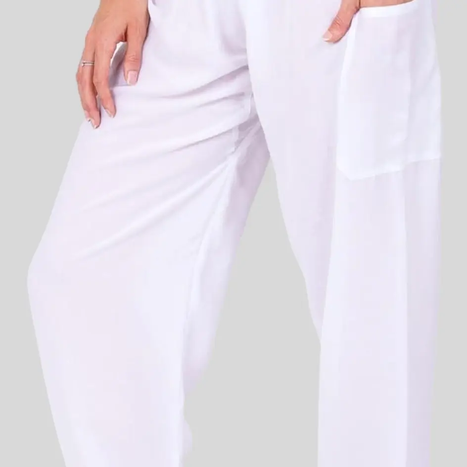 Harem pants designed with spandex, adding elasticity and stretch for ease of movement.