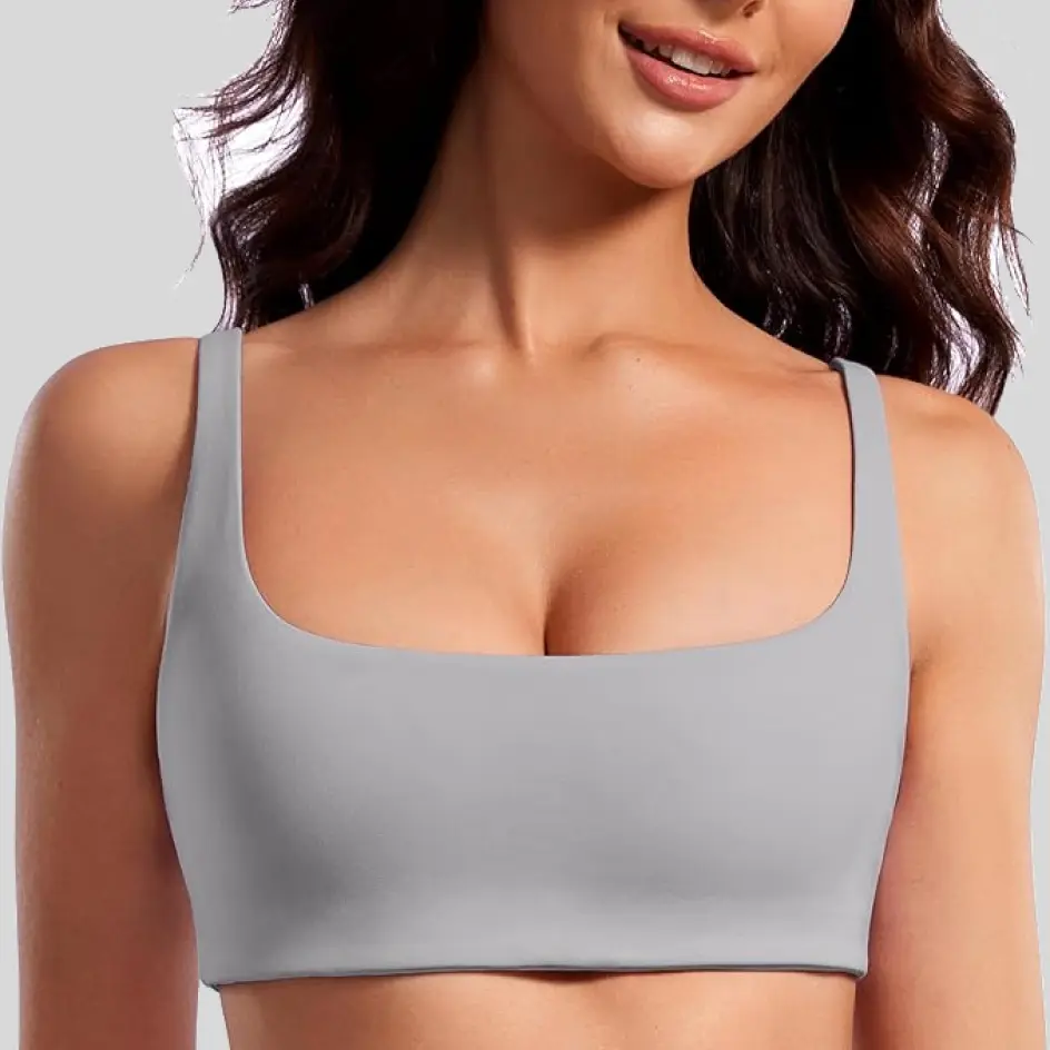 Sports bras in sport grey, featuring a cool and understated aesthetic.