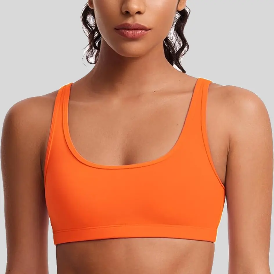 Sports bras in orange, creating a warm and dynamic style statement.