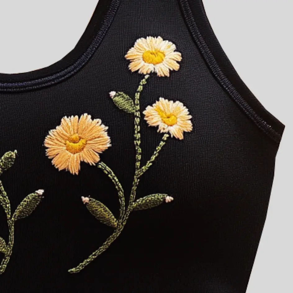 Strappy bras with embroidered details, adding a premium and textured design.