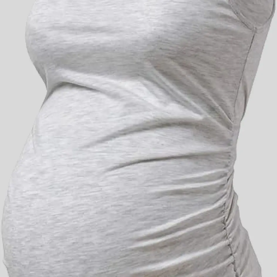 A maternity yoga outfit in sport grey, combining a neutral tone with moisture-wicking fabric for active movement.