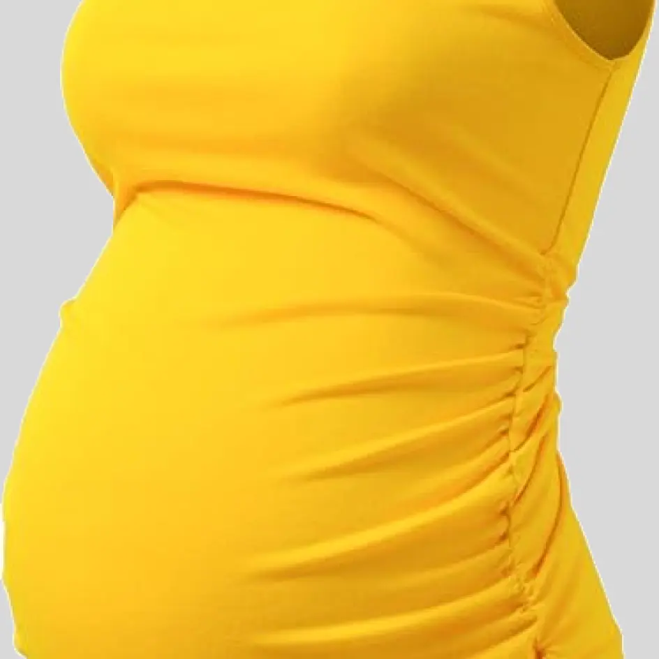 A maternity yoga legging and top in yellow, providing a vibrant and energetic look for pregnancy-friendly workouts.