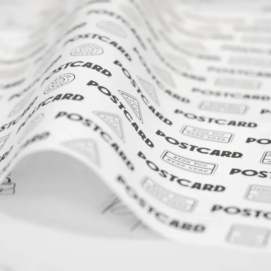 A crisp white tissue paper stack, offering a clean and elegant touch for premium packaging.
