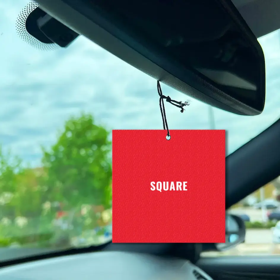 Square-shaped air freshener with bold printed graphics and a fresh scent.