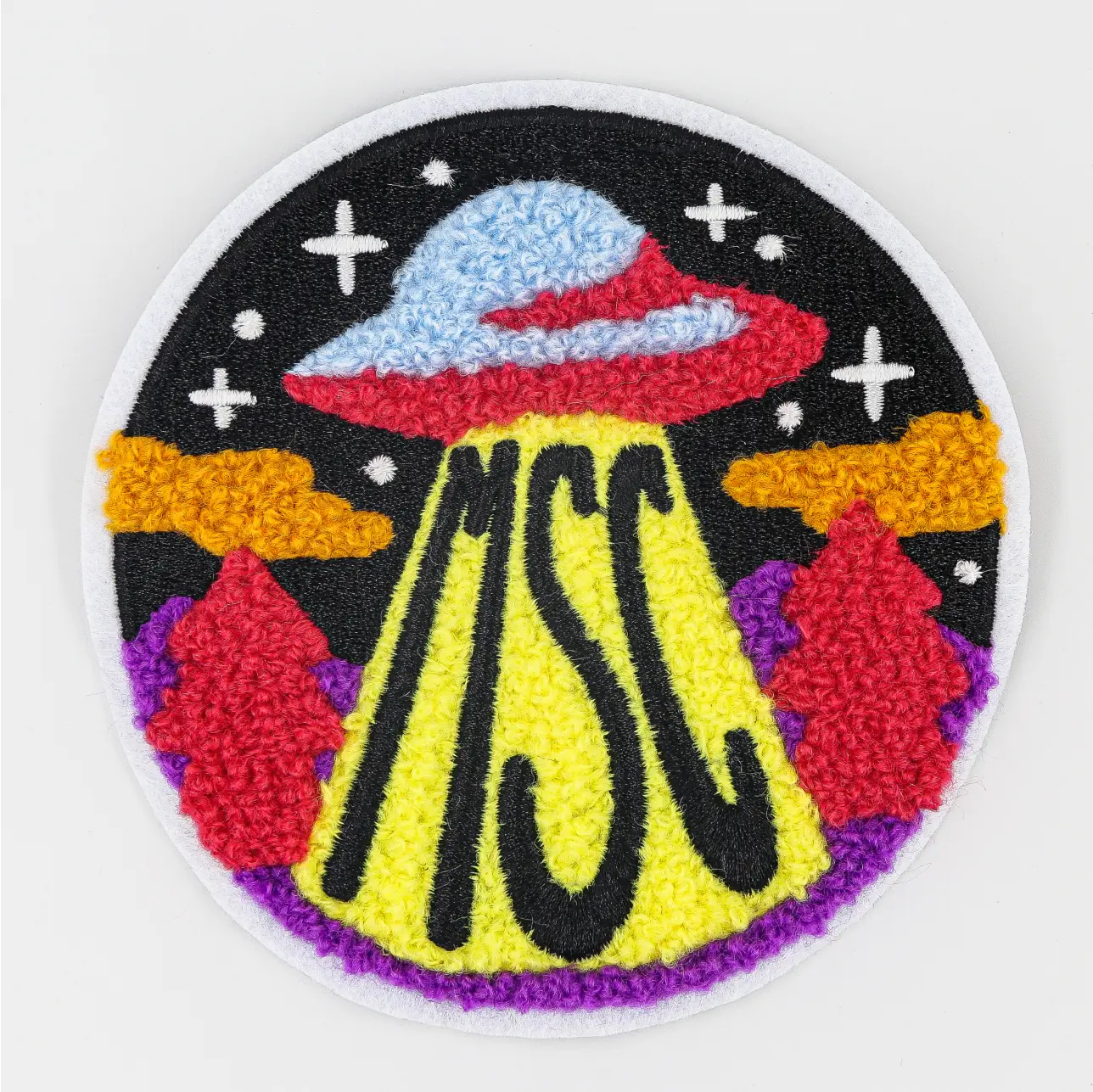 Custom chenille patch featuring vibrant colors and unique designs, perfect for personalizing clothing and accessories.