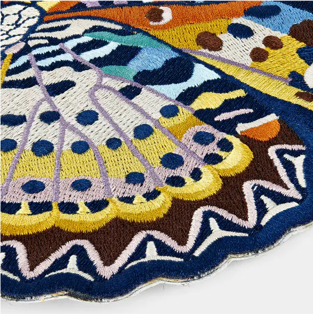 A stylish custom patch with a unique design, perfect for embellishing your favorite clothing or accessories.