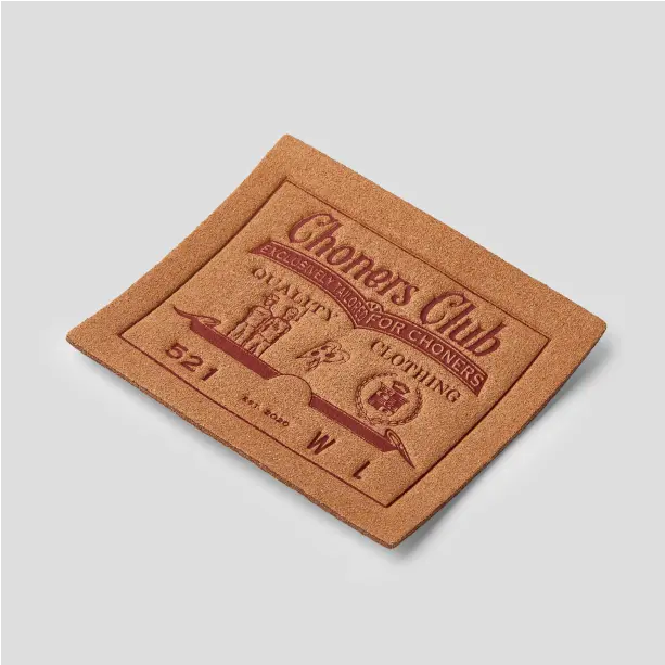 Unique custom leather patch showcasing detailed craftsmanship, ideal for adding a personal touch to your favorite items.