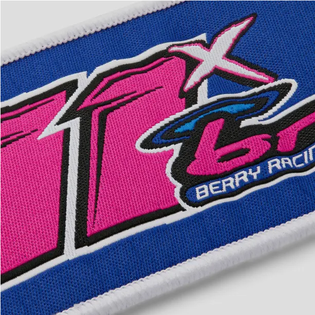 A detailed custom woven patch showcasing vibrant colors and unique patterns, ideal for adding a personal touch to any item.