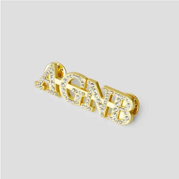 Custom text pins featuring personalized messages, perfect for gifts or events, adding a unique touch to any outfit.