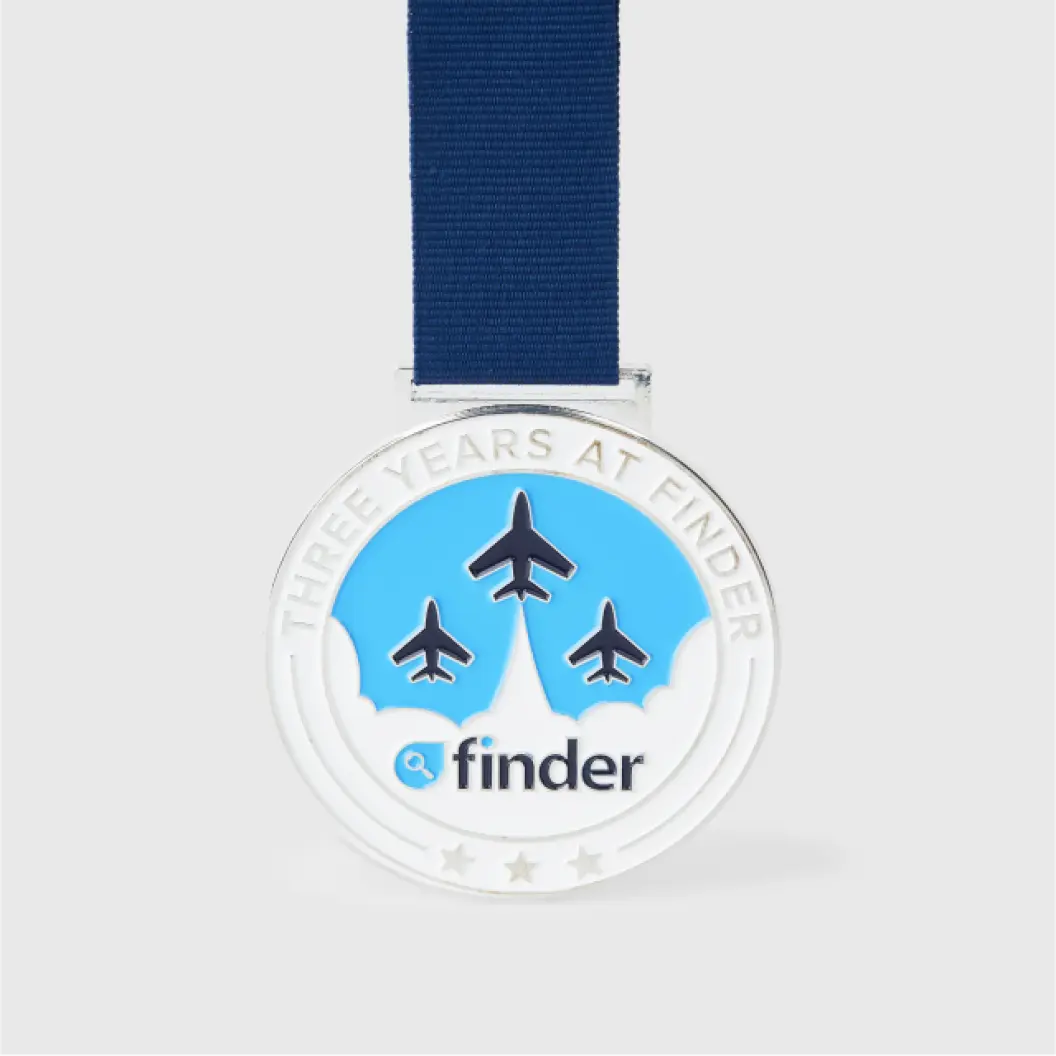 Medal with “Three Years at Finder” and three airplane symbols.