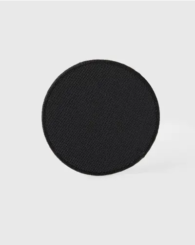 Plain circular black Velcro patch backing.