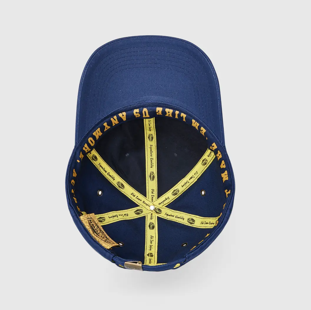 Navy blue cap interior with yellow details