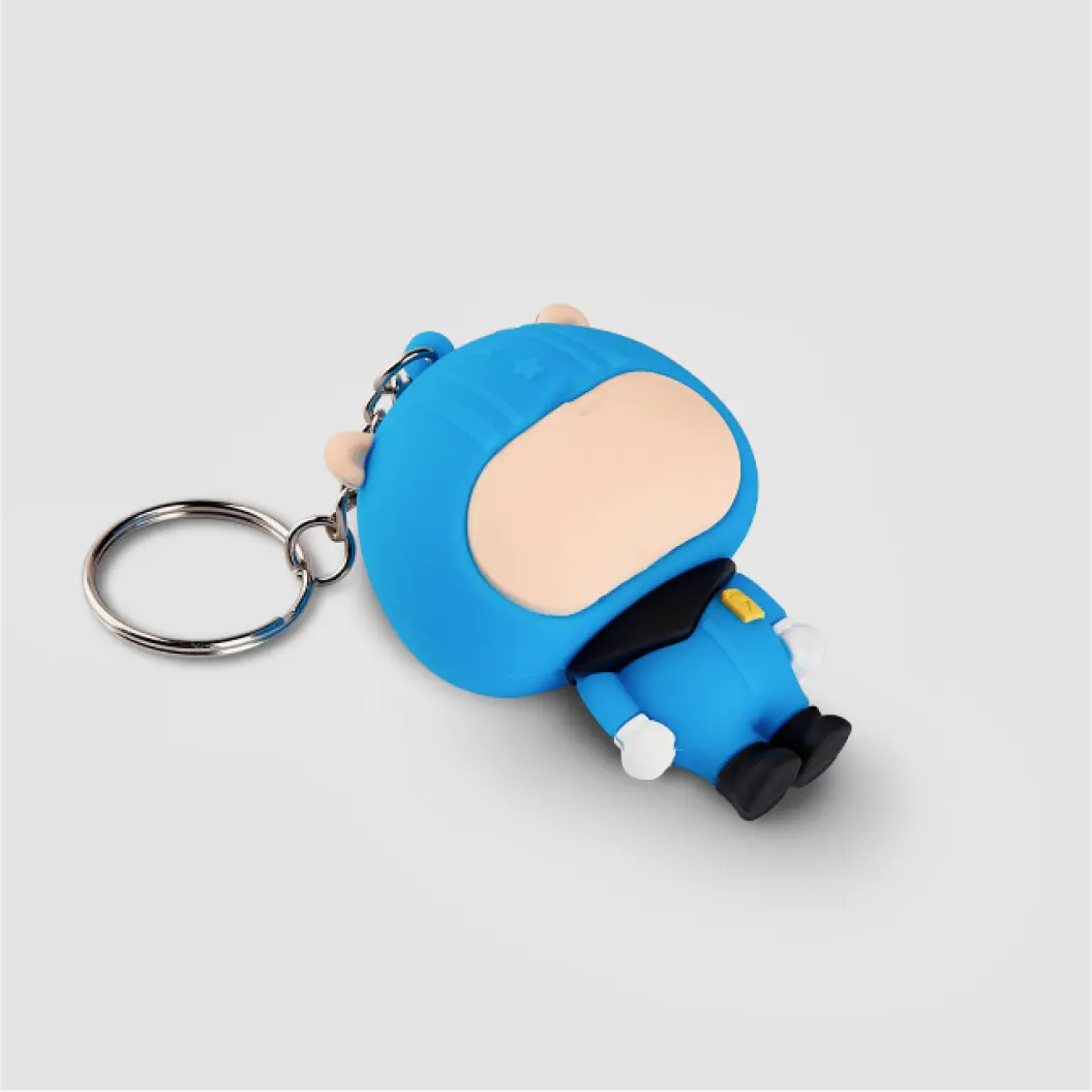 3D custom PVC keychain of a character with a large head, wearing a diving suit-like outfit and cat ears.