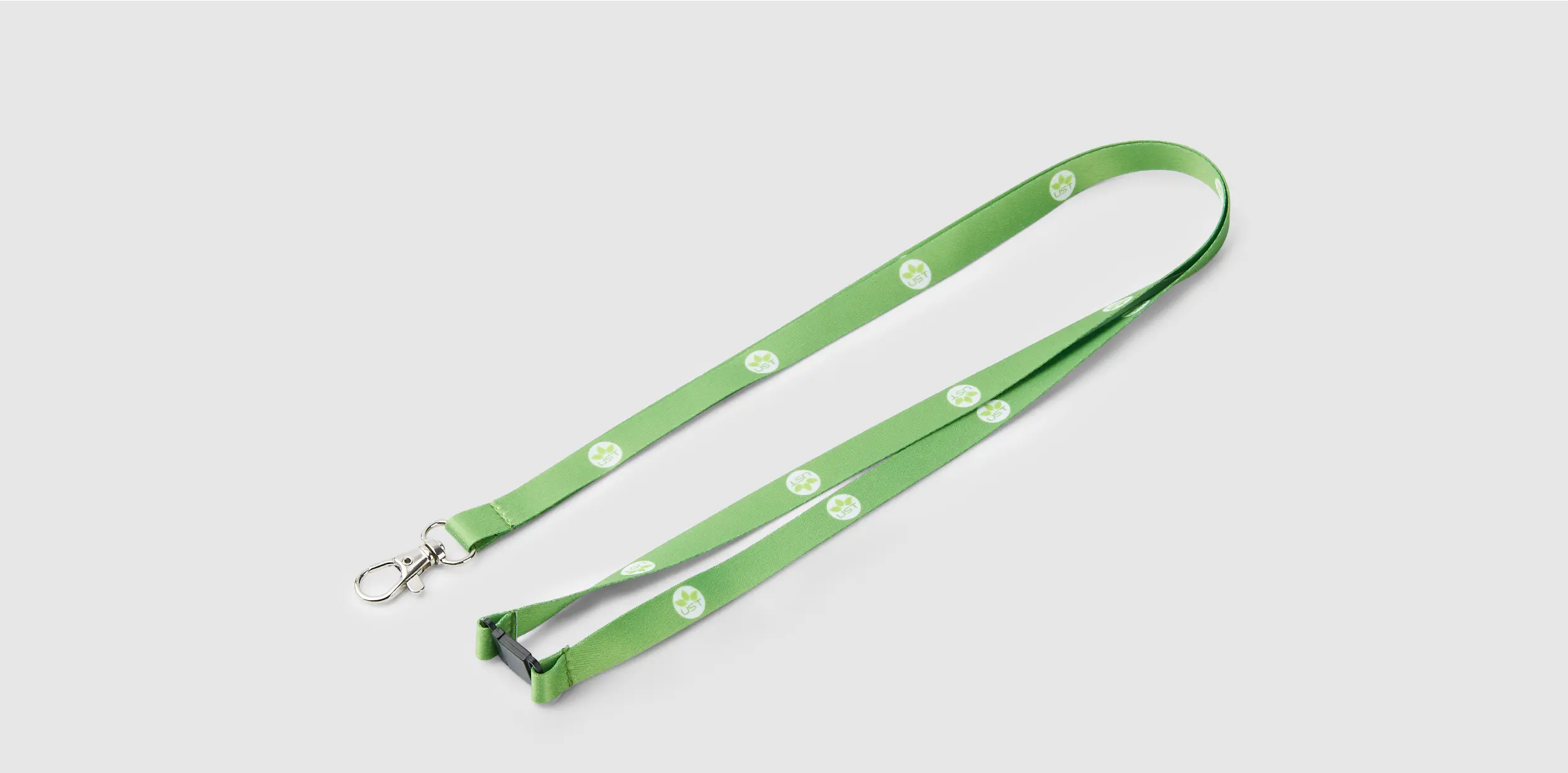 Green lanyard with a repeating white logo pattern.